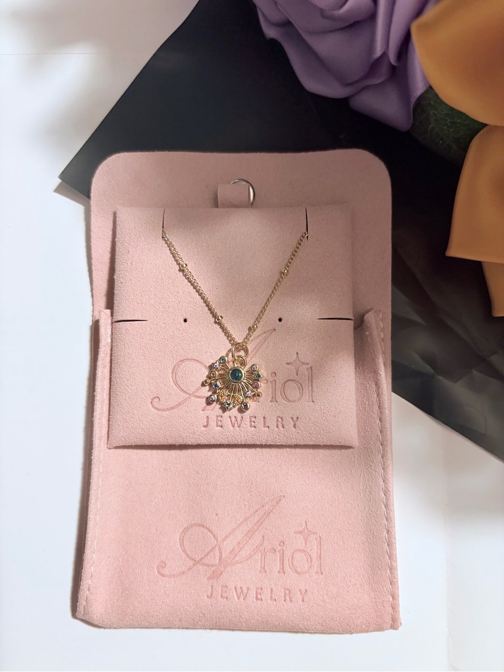 Gold plated Sunburst Pendant Necklace with Green Gem